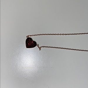 Michael Kors “red crystals pave heart pendant”
